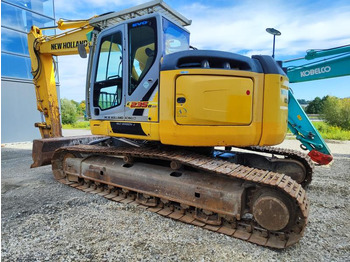 Гусеничный экскаватор NEW HOLLAND