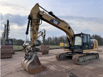 Гусеничный экскаватор CATERPILLAR 323EL