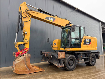 Колёсный экскаватор CATERPILLAR M318F