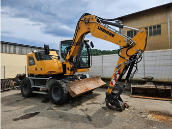Колёсный экскаватор LIEBHERR A 910
