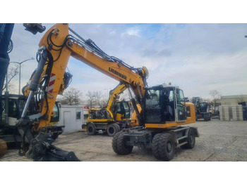Колёсный экскаватор LIEBHERR