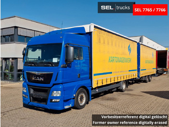 Тентованный грузовик MAN TGX 18.440