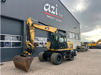 Колёсный экскаватор CATERPILLAR M313D