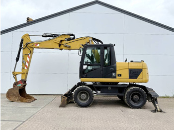 Колёсный экскаватор CATERPILLAR M313D