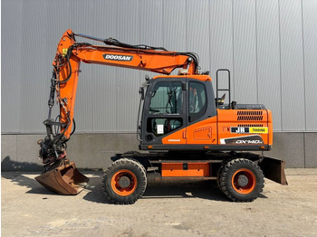 Колёсный экскаватор DOOSAN DX140W-5