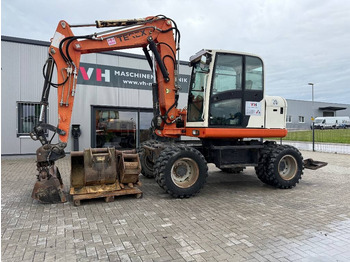 Колёсный экскаватор TEREX