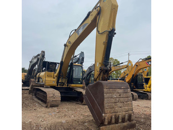 Гусеничный экскаватор CATERPILLAR