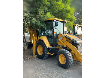 Экскаватор-погрузчик CATERPILLAR
