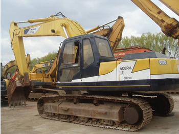 Гусеничный экскаватор KOBELCO