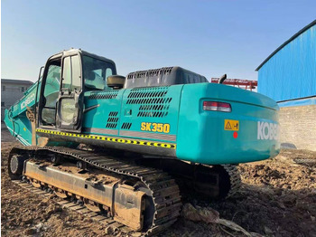Гусеничный экскаватор KOBELCO