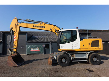 Колёсный экскаватор LIEBHERR