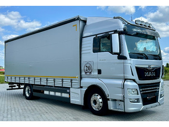 Тентованный грузовик MAN TGX 18.460
