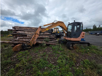 Экскаватор CASE