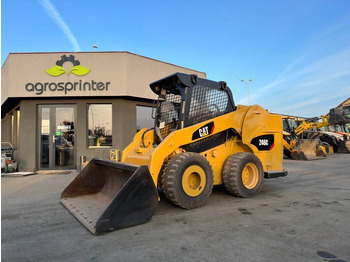 Мини-погрузчик с бортовым поворотом CATERPILLAR