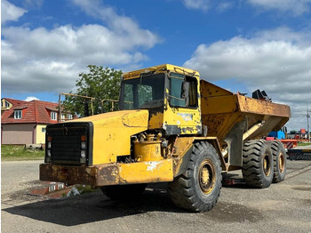 Сочленённый самосвал CATERPILLAR
