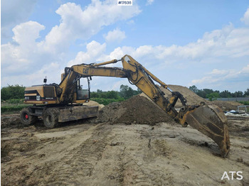 Гусеничный экскаватор CATERPILLAR M312