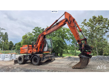 Колёсный экскаватор HITACHI