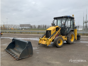 Экскаватор-погрузчик NEW HOLLAND