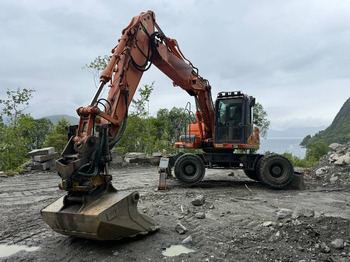 Колёсный экскаватор DOOSAN