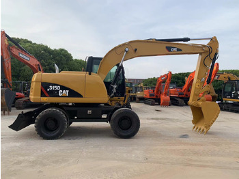 Колёсный экскаватор CATERPILLAR 315D
