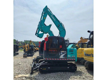 Гусеничный экскаватор KOBELCO