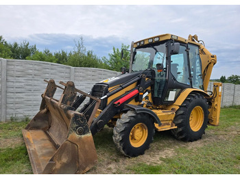 Экскаватор-погрузчик CATERPILLAR