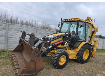 Экскаватор-погрузчик CATERPILLAR