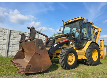 Экскаватор-погрузчик CATERPILLAR