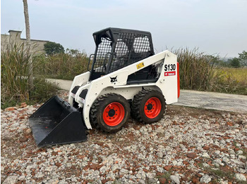 Мини-погрузчик с бортовым поворотом BOBCAT S130