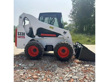 Мини-погрузчик с бортовым поворотом BOBCAT