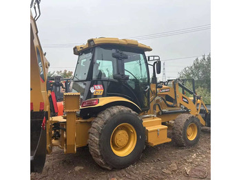 Экскаватор-погрузчик CATERPILLAR