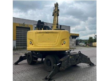 Колёсный экскаватор CAT 3022: фото 4