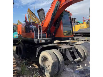 Колёсный экскаватор Doosan DX150W: фото 3