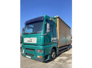 Тентованный грузовик MAN TGA 18.310