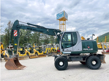 Колёсный экскаватор NEW HOLLAND