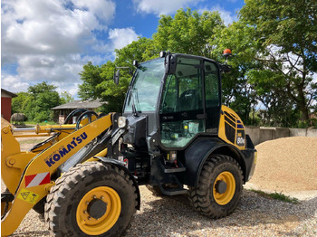 Компактный фронтальный погрузчик