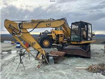 Колёсный экскаватор CATERPILLAR 312