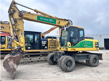 Колёсный экскаватор KOMATSU