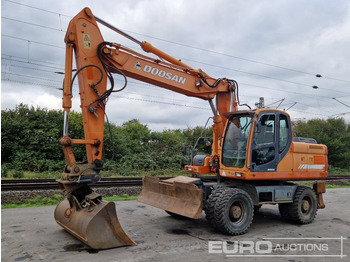 Колёсный экскаватор DOOSAN DX210