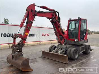 Колёсный экскаватор WACKER