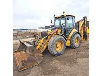 Экскаватор-погрузчик CATERPILLAR