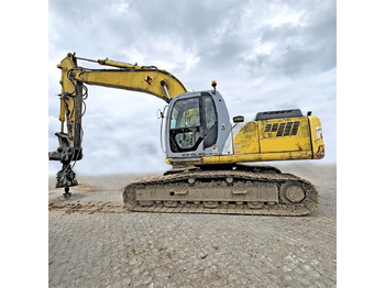 Гусеничный экскаватор NEW HOLLAND