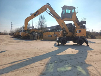 Колёсный экскаватор CATERPILLAR MH3022