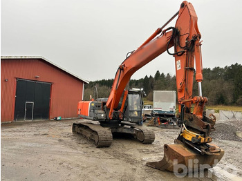 Гусеничный экскаватор