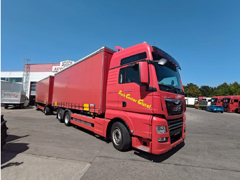 Грузовик-контейнеровоз/ Сменный кузов MAN TGX 26.510