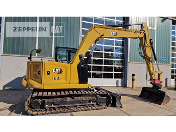 Cat 310 в лизинг Cat 310: фото 4