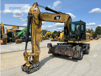 Колёсный экскаватор CATERPILLAR M318D