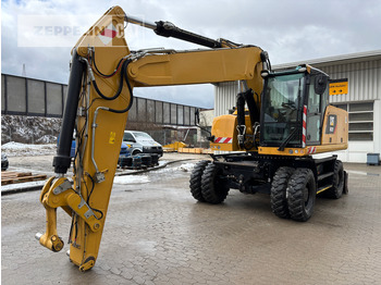 Колёсный экскаватор CATERPILLAR M322