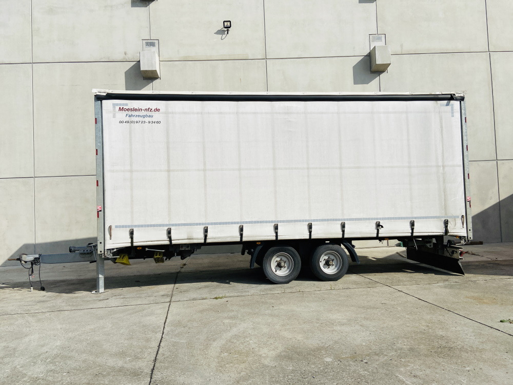 Möslein TP 11 Schwebheim Tandem- Schiebeplanenanhänger zum Durchladen - Тентованный прицеп: фото 1 Möslein TP 11 Schwebheim Tandem- Schiebeplanenanhänger zum Durchladen - Тентованный прицеп: фото 1