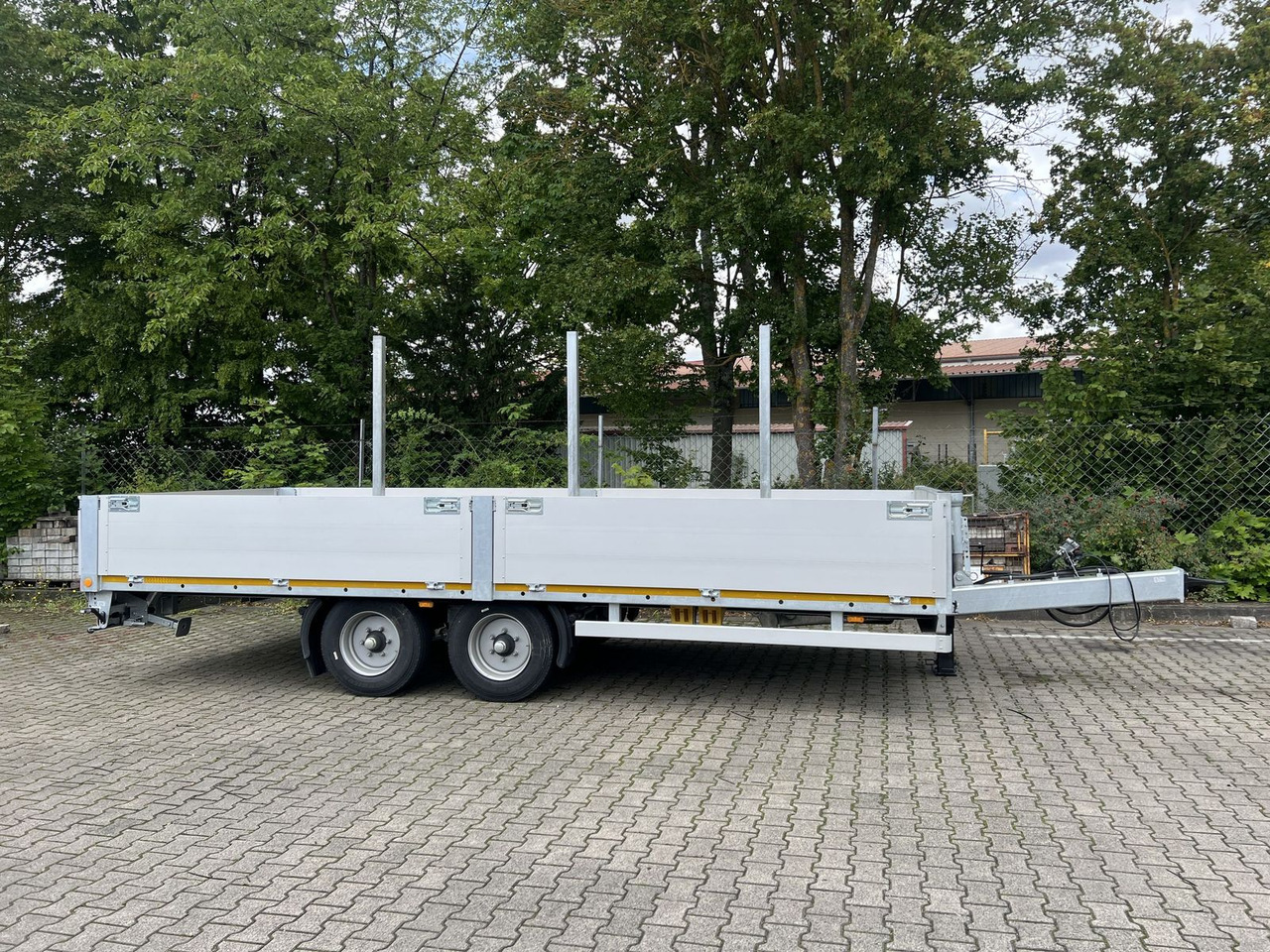 Möslein Tandem Pritsche- Tieflader mit Rungentaschen - Прицеп бортовой/ Платформа: фото 1 Möslein Tandem Pritsche- Tieflader mit Rungentaschen - Прицеп бортовой/ Платформа: фото 1